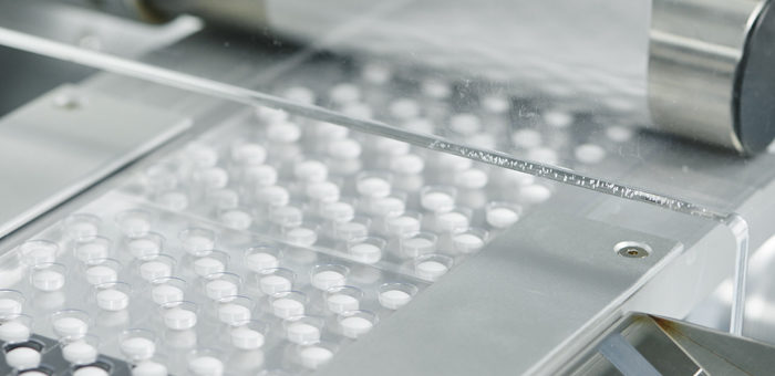 pills being packaged